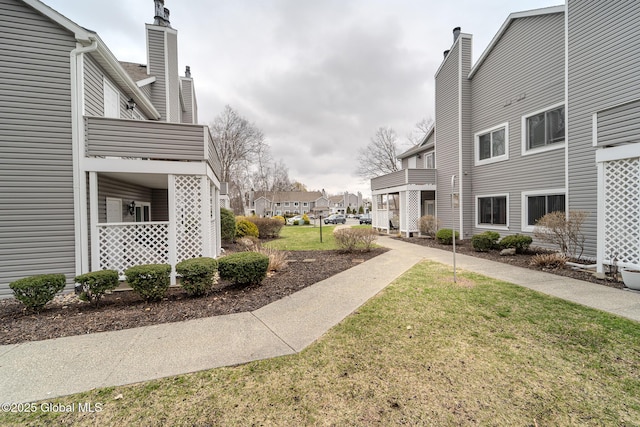 1976 Curry Rd Unit E-136, Schenectady, NY 12303 - view of property's community with a lawn and a residential view