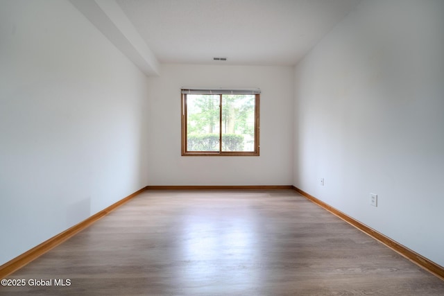 1976 Curry Rd Unit E-136, Schenectady, NY 12303 - empty room with wood finished floors and baseboards