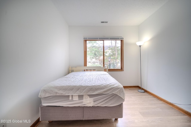 1976 Curry Rd Unit E-136, Schenectady, NY 12303 - bedroom featuring light wood finished floors and baseboards
