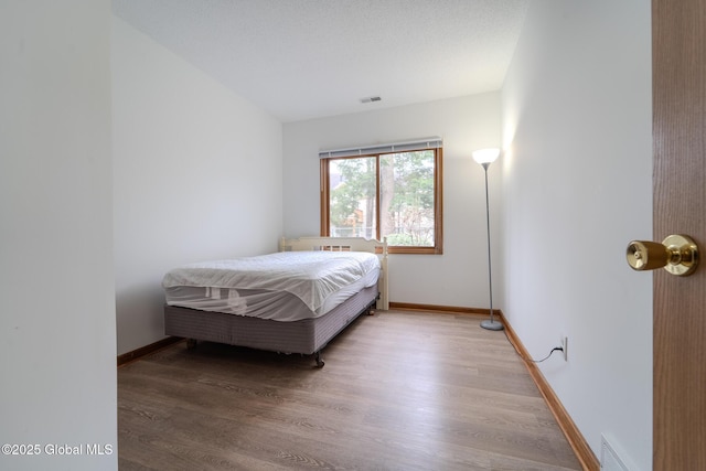 1976 Curry Rd Unit E-136, Schenectady, NY 12303 - bedroom featuring wood finished floors and baseboards