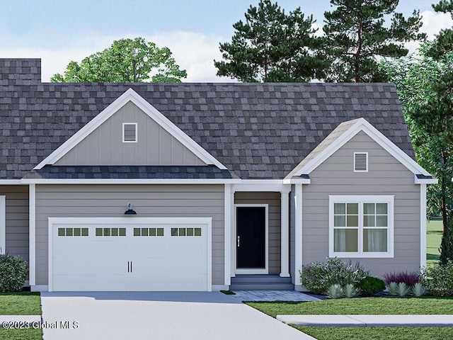 12 Anson Ct, Malta, NY 12020 - view of front of house with concrete driveway, board and batten siding, a garage, and roof with shingles
