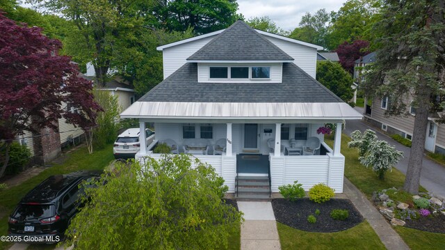 156 E Ave, Saratoga Springs, NY 12866 - view of front of home with a porch and a shingled roof