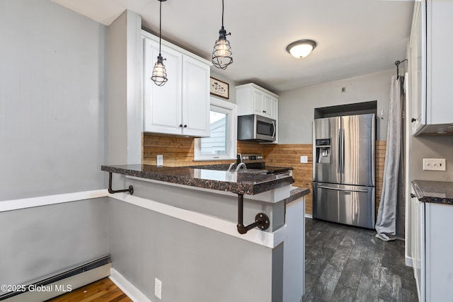 2044 Caldicott Rd, Rotterdam, NY 12303 - kitchen with stainless steel appliances, baseboard heating, a peninsula, white cabinetry, and dark wood finished floors
