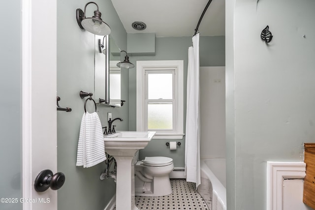 2044 Caldicott Rd, Rotterdam, NY 12303 - bathroom with a baseboard radiator, toilet, shower / bathtub combination with curtain, and a sink