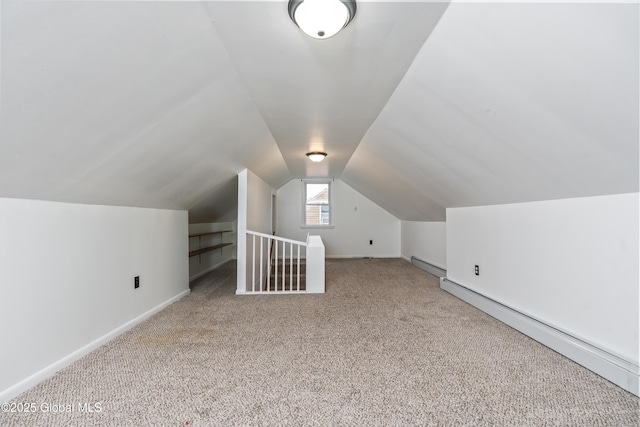 2044 Caldicott Rd, Rotterdam, NY 12303 - bonus room with carpet flooring, baseboard heating, a baseboard heating unit, vaulted ceiling, and baseboards