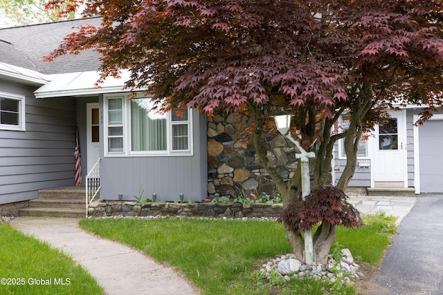 184 Main St, South Glens Falls, NY 12803 - entrance to property featuring roof with shingles