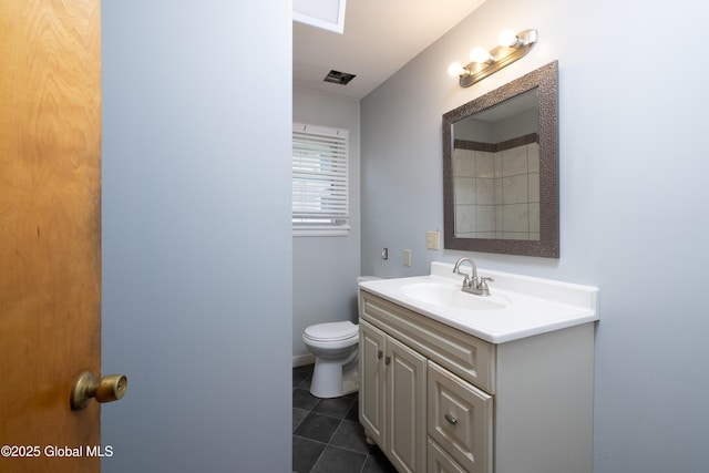 184 Main St, South Glens Falls, NY 12803 - full bathroom featuring vanity, toilet, and tile patterned floors