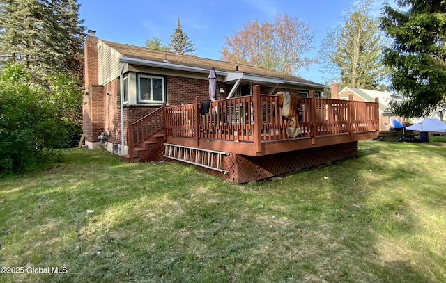 6 Kenyon Dr, Colonie, NY 12205 - back of property with a chimney, a deck, brick siding, and a lawn