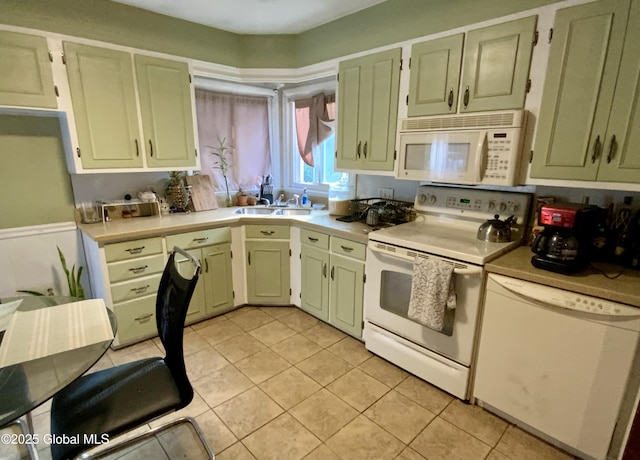 6 Kenyon Dr, Colonie, NY 12205 - kitchen with white appliances, a sink, light countertops, and light tile patterned floors