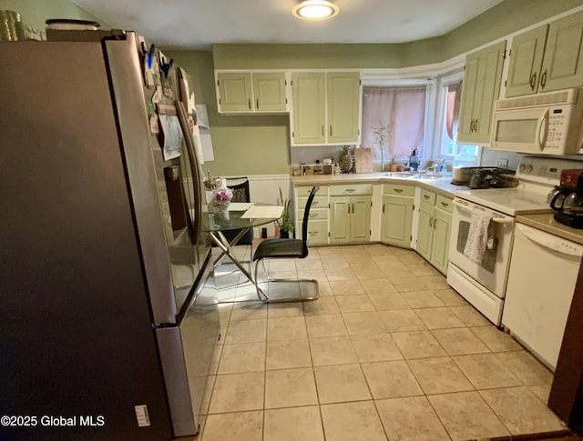 6 Kenyon Dr, Colonie, NY 12205 - kitchen featuring white appliances, light countertops, light tile patterned floors, and a sink