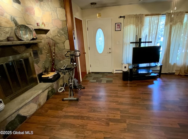 6 Kenyon Dr, Colonie, NY 12205 - foyer entrance featuring wood finished floors, baseboard heating, and plenty of natural light