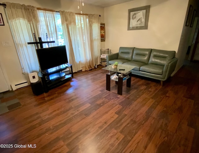 6 Kenyon Dr, Colonie, NY 12205 - living area with wood finished floors and a baseboard heating unit