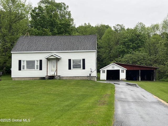 3778 County Rte 21, Whitehall, NY 12887 - view of front of house featuring entry steps, an outdoor structure, a front lawn, a garage, and a shingled roof
