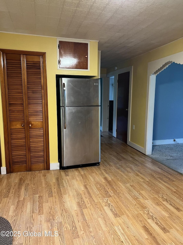 3778 County Rte 21, Whitehall, NY 12887 - kitchen featuring freestanding refrigerator, light wood-style floors, and baseboards