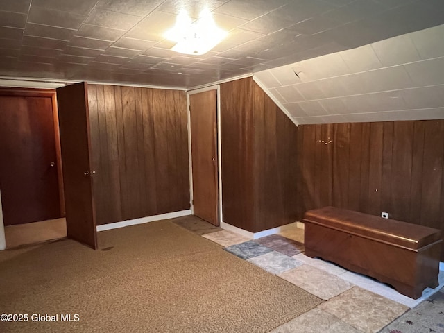 3778 County Rte 21, Whitehall, NY 12887 - additional living space with wooden walls, vaulted ceiling, and light colored carpet