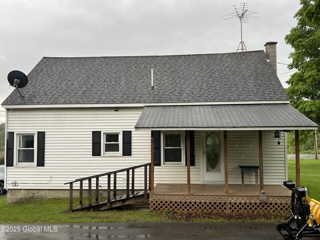 3778 County Rte 21, Whitehall, NY 12887 - view of front of home with roof with shingles, a chimney, and a porch