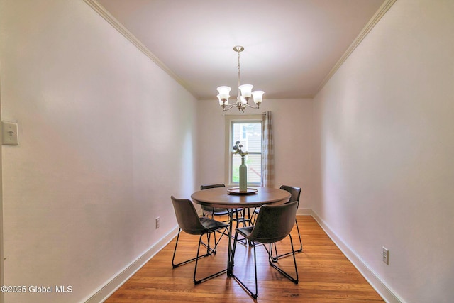 773 Charlton Rd, Charlton, NY 12019 - dining area with crown molding, a chandelier, and wood finished floors
