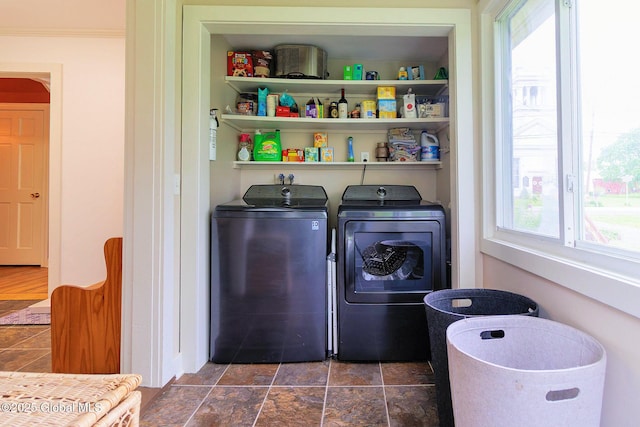 773 Charlton Rd, Charlton, NY 12019 - laundry area with washing machine and clothes dryer and dark stone finish floors