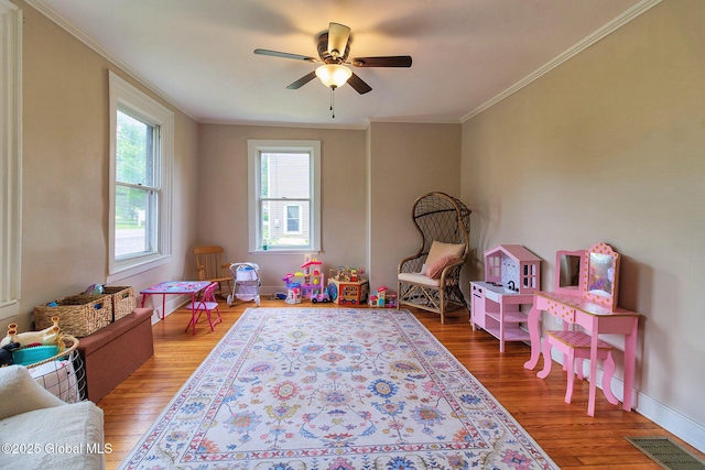 773 Charlton Rd, Charlton, NY 12019 - rec room with crown molding, wood finished floors, and a ceiling fan