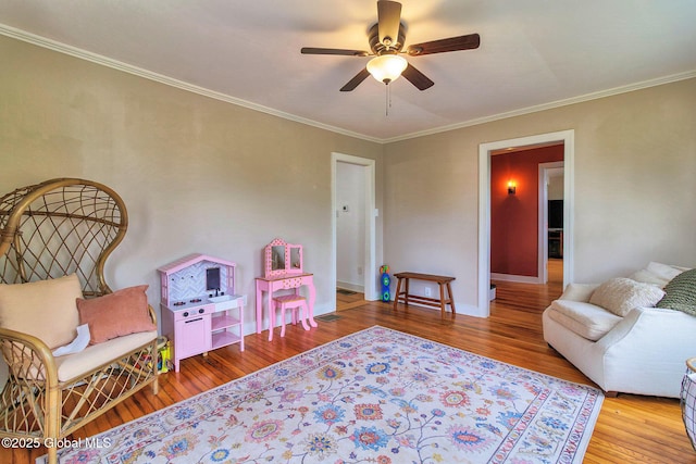 773 Charlton Rd, Charlton, NY 12019 - game room featuring wood finished floors, ornamental molding, and a ceiling fan