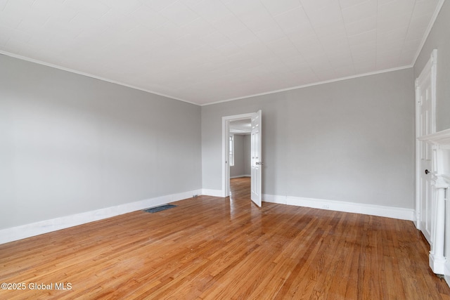 2127 2nd Ave, Watervliet, NY 12189 - empty room with light wood finished floors, crown molding, and baseboards