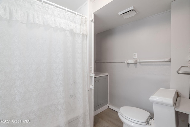 2127 2nd Ave, Watervliet, NY 12189 - bathroom featuring toilet and wood finished floors