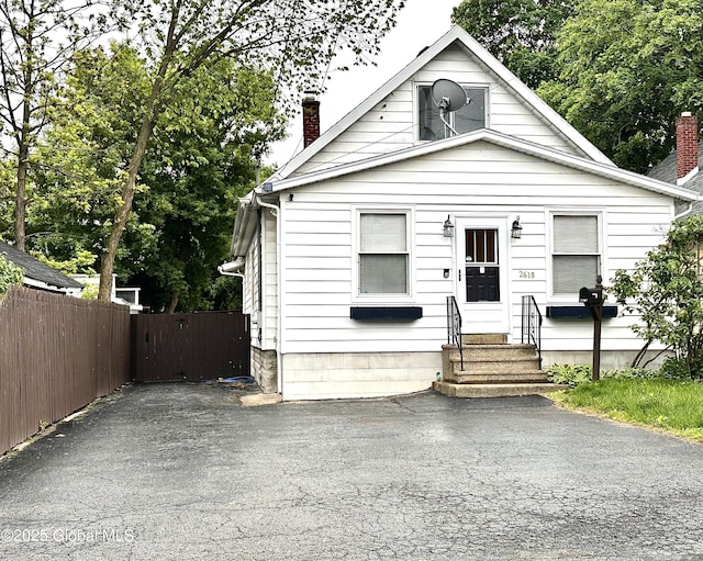 2618 Stanton St, Rotterdam, NY 12306 - view of front of house featuring entry steps and a chimney