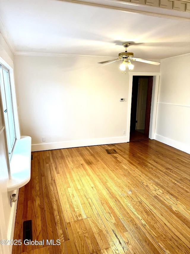 2618 Stanton St, Rotterdam, NY 12306 - unfurnished room with crown molding, light wood-type flooring, baseboards, and ceiling fan