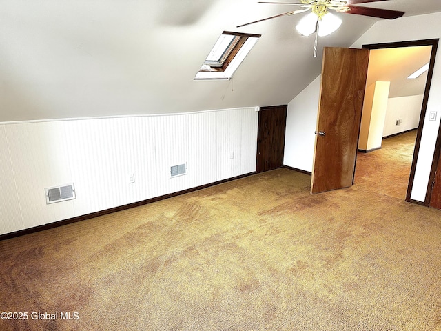 2618 Stanton St, Rotterdam, NY 12306 - bonus room featuring a ceiling fan, lofted ceiling, a skylight, carpet floors, and baseboards