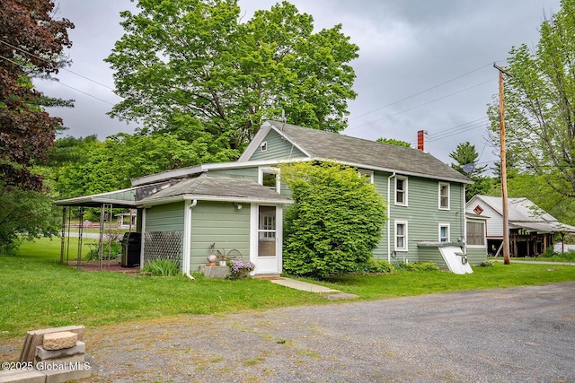 1038 Vly Summit Rd, Cambridge, NY 12834 - view of front of house featuring a front lawn and a shingled roof