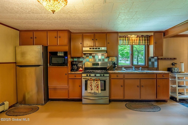 1038 Vly Summit Rd, Cambridge, NY 12834 - kitchen featuring stainless steel appliances, under cabinet range hood, a sink, brown cabinetry, and ornamental molding