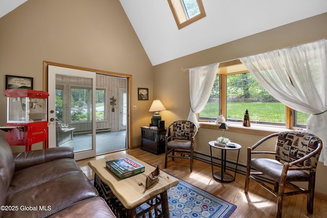 38 N Island Rd, Bolton, NY 12814 - living room featuring high vaulted ceiling, wood finished floors, and a skylight