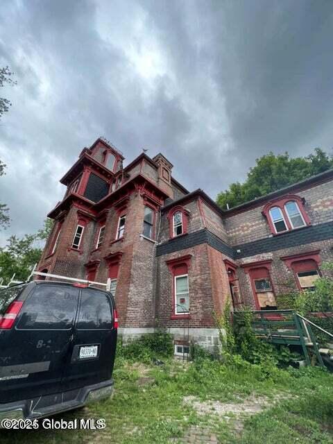 3 118th St, Troy, NY 12182 - victorian home with brick siding