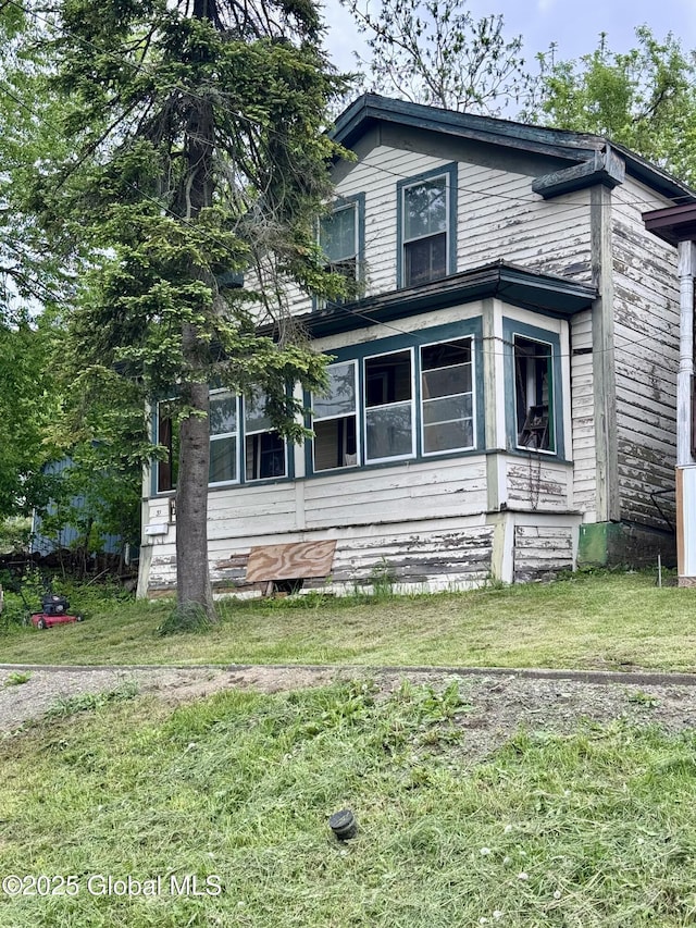 31 Williams St, Whitehall Village, NY 12887 - view of front of house with a front lawn