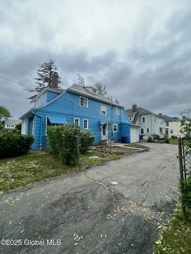 194 S Main Ave, Albany, NY 12208 - view of front of property with a chimney