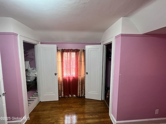 194 S Main Ave, Albany, NY 12208 - unfurnished bedroom featuring lofted ceiling and wood finished floors