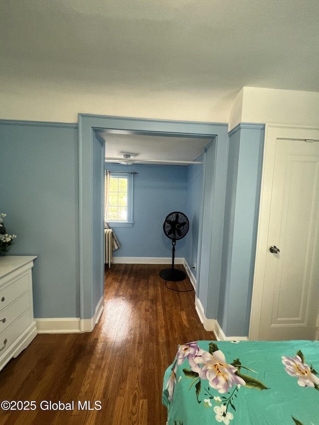 194 S Main Ave, Albany, NY 12208 - bedroom with dark wood-style floors and baseboards