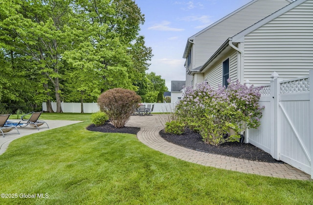 6 Copenhagen Ct, Colonie, NY 12047 - view of yard with a patio area and a gate