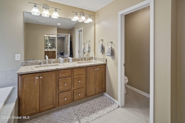 6 Copenhagen Ct, Colonie, NY 12047 - full bath with double vanity, toilet, tile patterned floors, and tiled tub