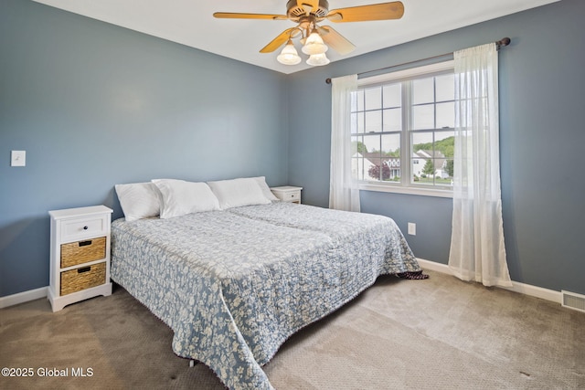 6 Copenhagen Ct, Colonie, NY 12047 - carpeted bedroom featuring baseboards and ceiling fan