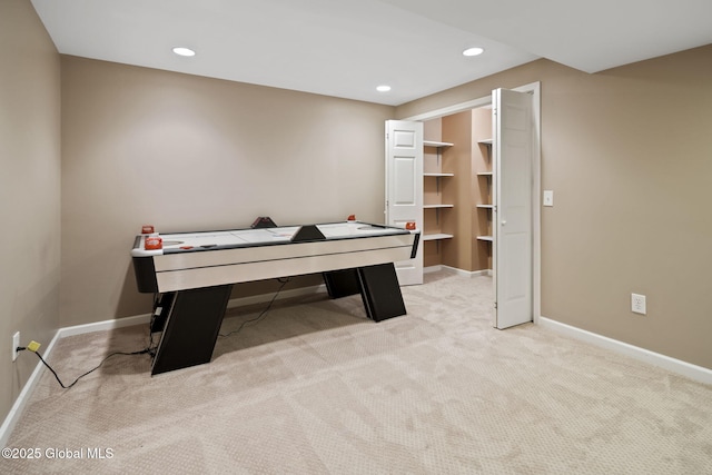 6 Copenhagen Ct, Colonie, NY 12047 - recreation room with light carpet, baseboards, and recessed lighting