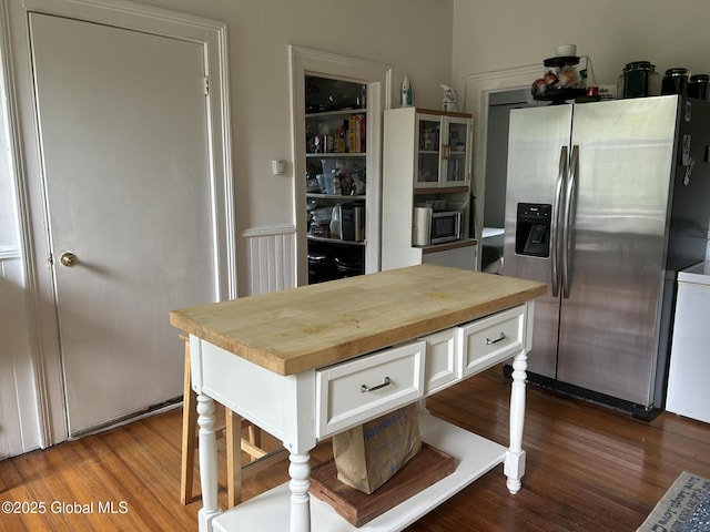 281 10th St, Troy, NY 12180 - kitchen with appliances with stainless steel finishes, butcher block counters, wood finished floors, and white cabinets