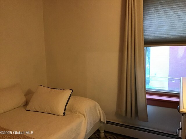 281 10th St, Troy, NY 12180 - bedroom featuring baseboard heating