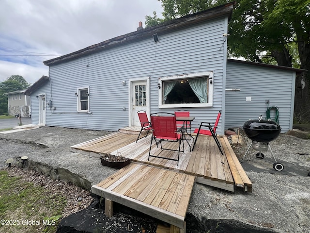 14 Lower Turnpike Rd, Granville, NY 12832 - back of property featuring outdoor dining area and a deck
