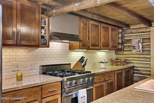 399 Loch Muller Rd, Schroon, NY 12870 - kitchen featuring stainless steel gas stove, rustic walls, under cabinet range hood, wood ceiling with exposed beams, and open shelves