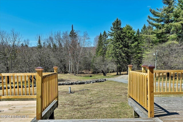 399 Loch Muller Rd, Schroon, NY 12870 - view of grassy yard featuring a wooden deck and a view of trees