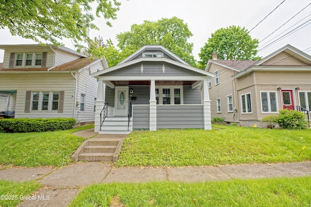 35 Wallace St, Scotia, NY 12302 - view of front facade featuring covered porch and a front yard