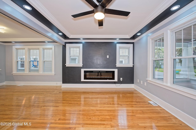 35 Wallace St, Scotia, NY 12302 - unfurnished living room with ornamental molding, light wood-type flooring, ceiling fan, a fireplace, and recessed lighting