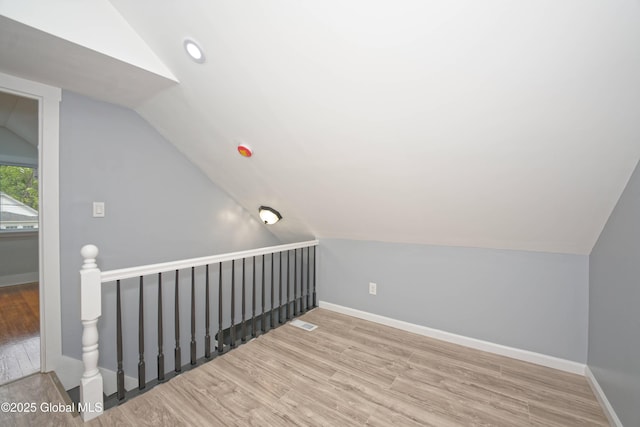35 Wallace St, Scotia, NY 12302 - additional living space featuring vaulted ceiling, wood finished floors, and baseboards