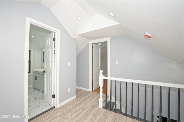 35 Wallace St, Scotia, NY 12302 - bonus room featuring vaulted ceiling, baseboards, recessed lighting, and light wood finished floors